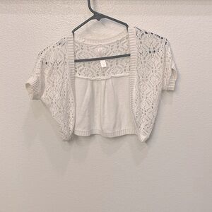 This is a cute sweater to put over a dummer dress!